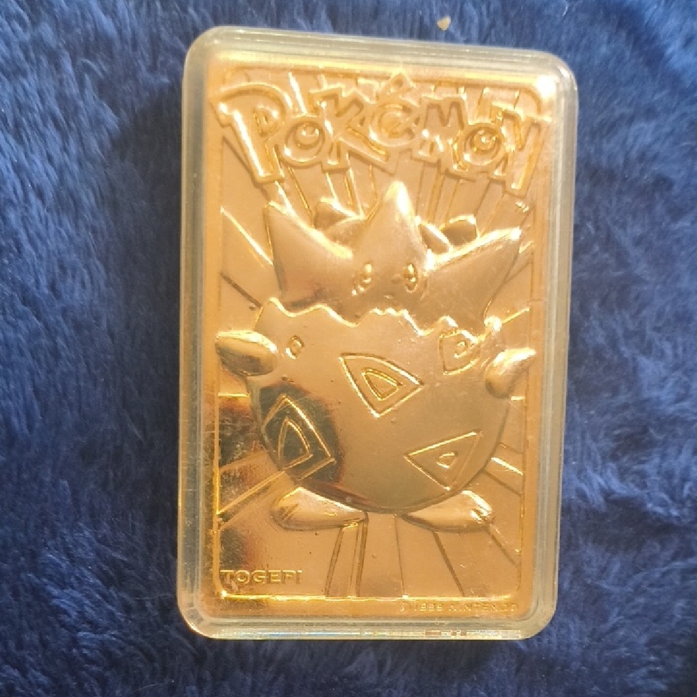 Pokemon Gold Togepi Collectible Plaque on Blue Plush